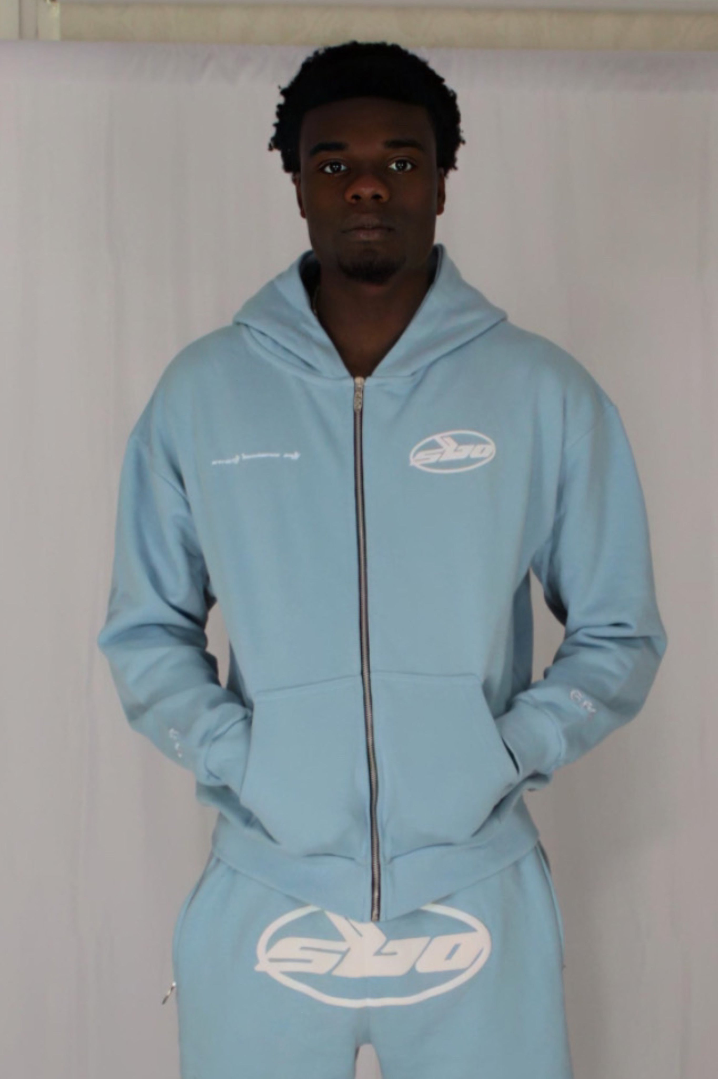 CIRCLE LOGO BABY BLUE ZIP UP HOODIE